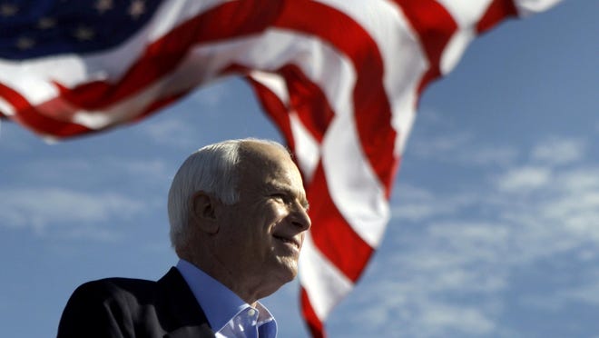 In this Nov. 3, 2008 file photo, Republican presidential candidate Sen. John McCain, R-Ariz. speaks at a rally outside Raymond James Stadium in Tampa, Fla.