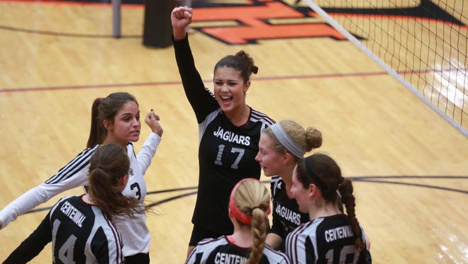 Jaali Winters (17) celebrates with Ankeny Centennial teammates in a regional semifinal match. The Jaguars won a final Tuesday to reach state.