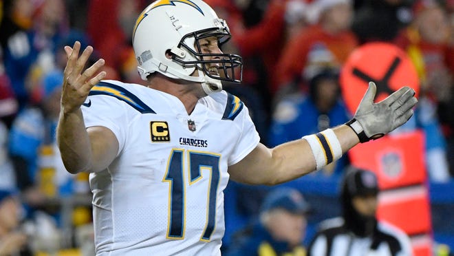 Los Angeles Chargers quarterback Philip Rivers (17) gestures during the second half of an NFL football game against the Kansas City Chiefs in Kansas City, Mo., Saturday, Dec. 16, 2017. The Chiefs won, 30-13. (AP Photo/Ed Zurga)
