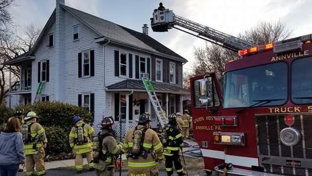 Emergency crews fight a fire in a second floor bedroom at 428 E. Main St., Annville, on Monday, March 19, 2018. The fire was mostly contained to the bedroom, but the house sustained considerable smoke damage.
