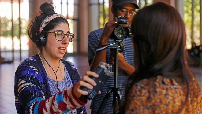 University of Texas at El Paso Borderzine students conduct an interview.