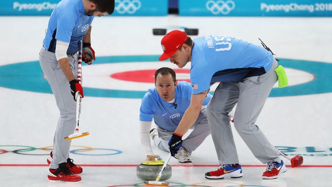 Matt Hamilton, Tyler George and John Landsteiner of Team USA compete in the men's curling semifinal against Canada at the 2018 Winter Olympic Games on Feb. 22, 2018 in Gangneung, South Korea.