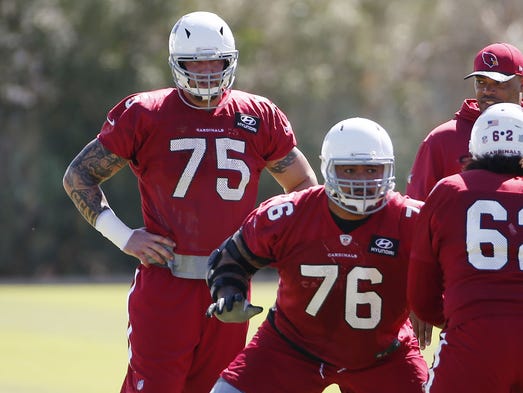 Arizona Cardinals offensive guard Alex Boone (75) watches