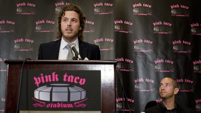 In 2006, Harry Morton, (left) president & CEO of Pink Taco, and Spencer Villasenor, a Hard Rock/Morton family executive, held a news conference where they announced their desire to secure the naming rights to the Cardinals' Glendale stadium.