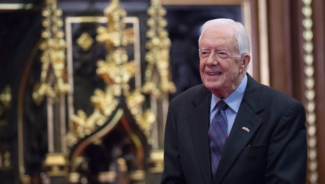 Former U.S. President Jimmy Carter receives delivers a lecture on the eradication of the Guinea worm, at the House of Lords on February 3, 2016 in London.