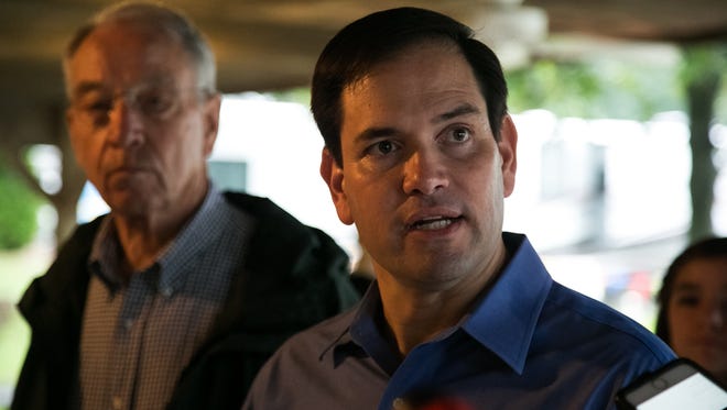 Republican presidential hopeful Marco Rubio, right, and Senator Chuck Grassley talk to the media at the Iowa State Fair on Tuesday, August 18, 2015.