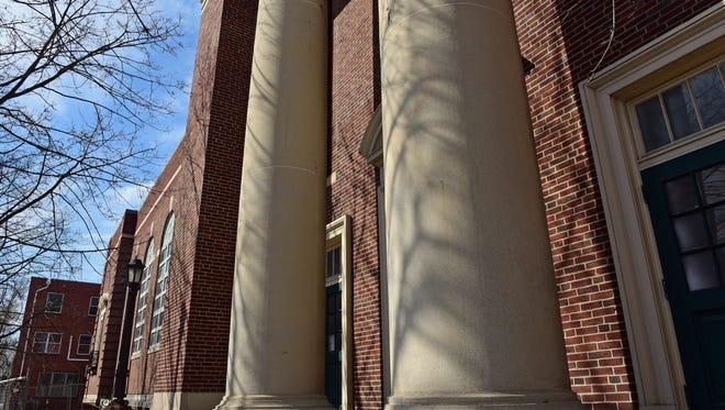 Pillars command the front of the former Central Junior High School along Queen Street. The building, which was once also home to Chambersburg High School,  will soon be transformed into business offices and apartments, with work to begin this summer.