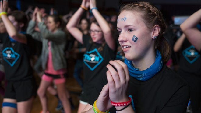 Sophomore Sydnee Strickler, right, dances during the mini-Thon at York Suburban High School last year. This year's installment of Thon raised more than $10 million.