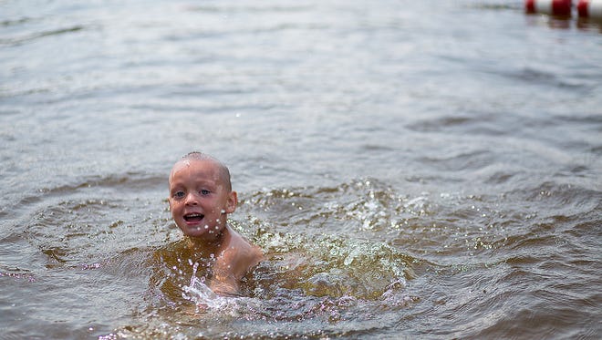 A girl swims at Nepco Lake County Park in Wisconsin Rapids in this 2016 file photo.
