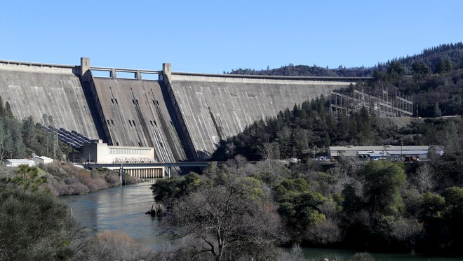 A higher volume of water flows through the power plant at Shasta Dam and into the lower Sacramento River on Wednesday.