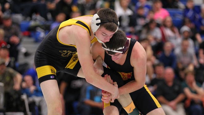 Windsor's Corey Swartz, left, wrestles Ithaca's Darren Rich during the Southern Tier Athletic Conference tournament in 2017.