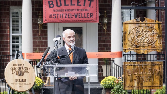 Tom Bulleit speaks to the crowd during the official opening of the new Bulleit Bourbon Distillery on Monday afternoon. 9/15/14