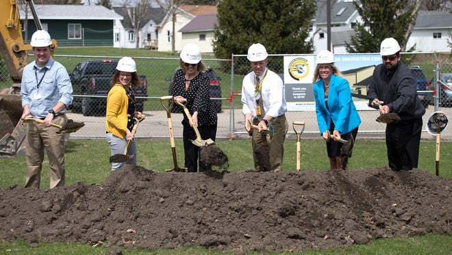 Waupun school district held a groundbreaking Tuesday, May 1, 2018 for its new Warrior Innovation Center. From left to right are Doug Disch, Career and Technical Education Coordinator. Erin Siedschlag, Assistant Principal.  Waupun School Counselor Jessica Mueller, Principal Steve Lenz, Superintendent Tonya Olson and Tech Education teacher Ryan Seichter.  Doug Raflik/USA TODAY NETWORK-Wisconsin