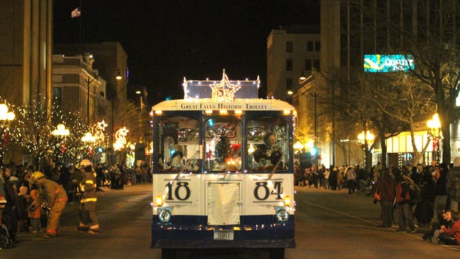 The Great Falls Historic Trolley makes its way down Central Avenue during the Parade of Lights in Great Falls.