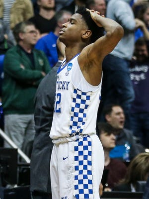 Kentucky's Shai Gilgeous-Alexander reacts after missing the game-tying three-point shot as Kansas State won 61-58 in Thursday night's Sweet Sixteen game in Atlanta, March 22, 2018.