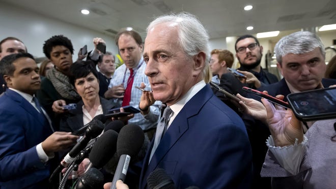 FILE - In this Dec. 4, 2018, file photo, Sen. Bob Corker, R-Tenn., speaks to reporters at the Capitol in Washington. President Donald Trumpâs most prominent GOP critics on Capitol Hill are days away from completing their Senate careers, raising the question of who will take their place as willing to publicly criticize a president who remains popular with Republican voters. Sens. Jeff Flake of Arizona and Bob Corker of Tennessee engaged in a war of words with the president on myriad issues over the past 18 months, generating headlines and fiery tweets from a president who insists on getting the last word. (AP Photo/J. Scott Applewhite, File)