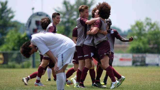 Bearden celebrates after Caleb Wilkins (6) makes the game winning goal during their game on Saturday, May 19, 2018 at Farragut.
