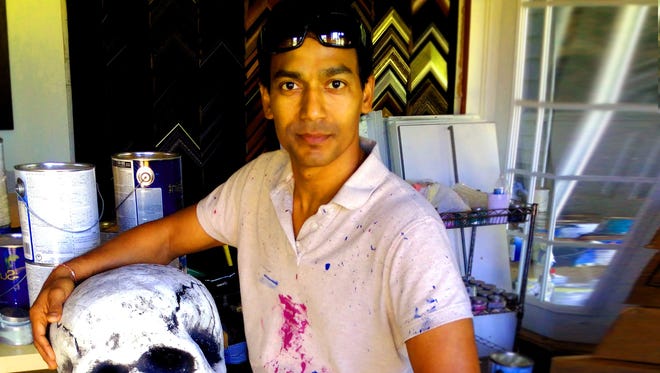 Artist SinGh pictured in his studio in Kalamazoo in 2016.