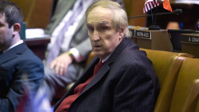 Assemblyman Vito Lopez, D-Brooklyn, sits at his desk in the Assembly Chamber at the Capitol on April 30, 2013. He resigned days later after he was censured for repeated sexual harassment.