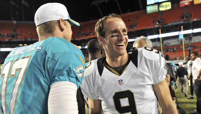 The Saints and Dolphins met in preseason, but QBs Drew Brees (9) and Ryan Tannehill will square off when it counts for the first time on Monday night.