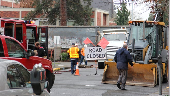 Part of Ferry Street NE was closed Wednesday morning due to tractor hitting a natural gas line.