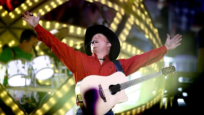 Garth Brooks performs during his world tour on Oct. 16, 2015, at Talking Stick Resort Arena in Phoenix.