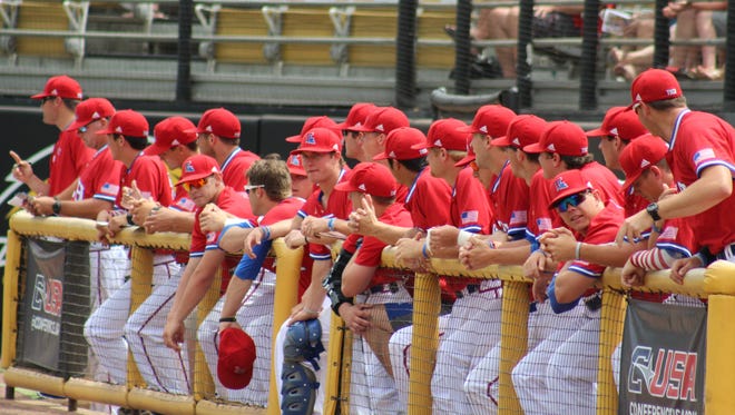 Louisiana Tech players look on during Friday's game against No. 13 Florida Atlantic. The Bulldogs eliminated the Owls in the Conference USA Tournament.