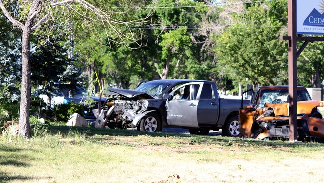 The scene of a morning vehicle crash on Main Street in Cedar City on Saturday, June 18, 2016.
