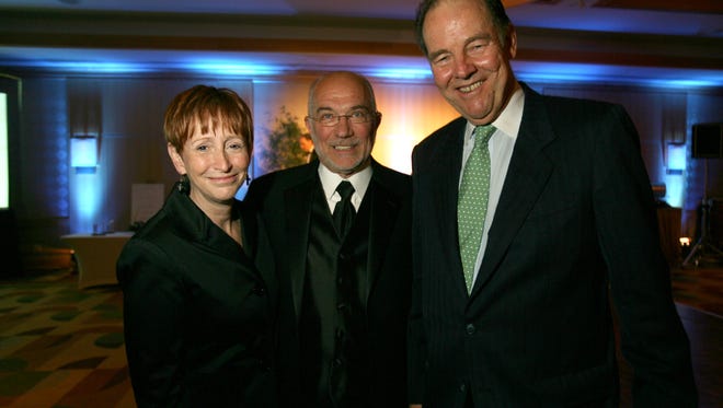 Former County College of Morris President Dr.  Edward Yaw, center, with his wife, Karen Milne, and and former governor Thomas H. Kean, in a 2009 file photo.