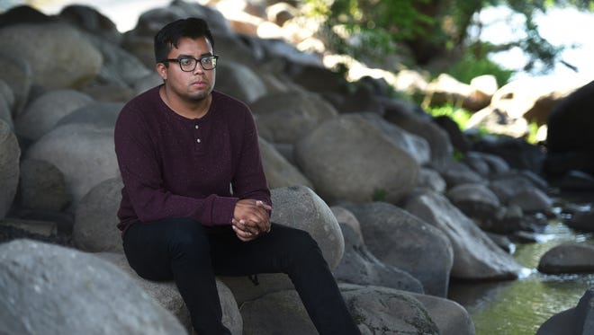 Alex Perez, of Yerington, poses for a portrait along the Truckee River in Reno on Sept. 1, 2017. Perez, now 23 years old, has Deferred Action for Childhood Arrivals, or DACA, status and came to the United States when he was four. Jason Bean/Reno Gazette-Journal- USA TODAY NETWORK