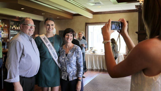 Miss Wisconsin USA's Kate Redeker of Sheboygan poses for photos during a send-off reception at Pine Hills Country Club Sunday May 15, 2016 at Pine Hills in Sheboygan.  Redeker will be a contestant in the Miss USA pageant.