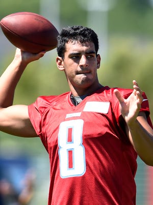 Titans quarterback Marcus Mariota (8) throws a pass during practice at St. Thomas Sports Park Friday July 31, 2015, in Nashville, Tenn. 