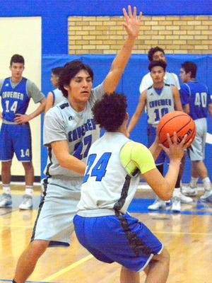 Cavemen senior shooting guard Micah Calderon looks to get a stop against junior guard Matt Rendon during Thursday's practice. Carlsbad will be back at home this weekend for the first time since Dec. 1.
