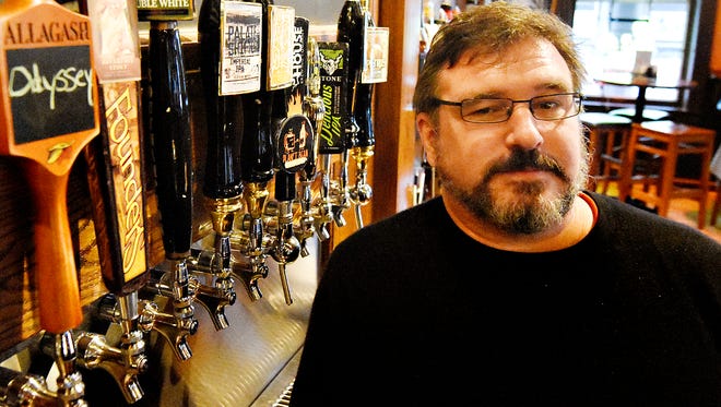 Owner Scott Eden is shown at Holy Hound Taproom in York City Wednesday, Feb. 10, 2016. The taproom will soon be offering selections from Michigan-based Short's Brewing Company, who will soon be distributing outside of their own state. (Dawn J. Sagert - The York Dispatch)