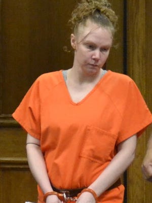 Jennifer Fendryk enters Oconto County Circuit Court on Wednesday for sentencing on five felony child abuse charges involving the young children of then-boyfriend, Shawn Paholke.