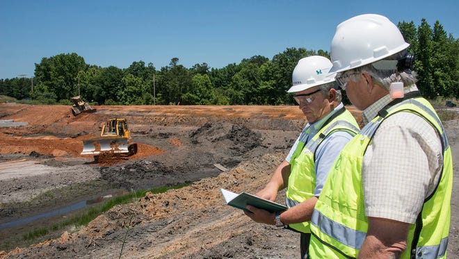 Engineers survey the initial stages of the Savannah River Site coal-ash basin landfill in Aiken County.