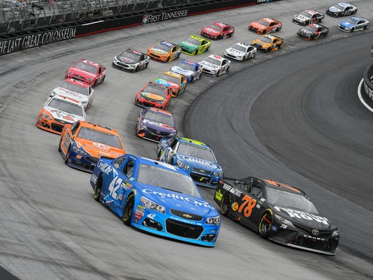 Kyle Larson (42) and Martin Truex Jr. (78) lead a restart