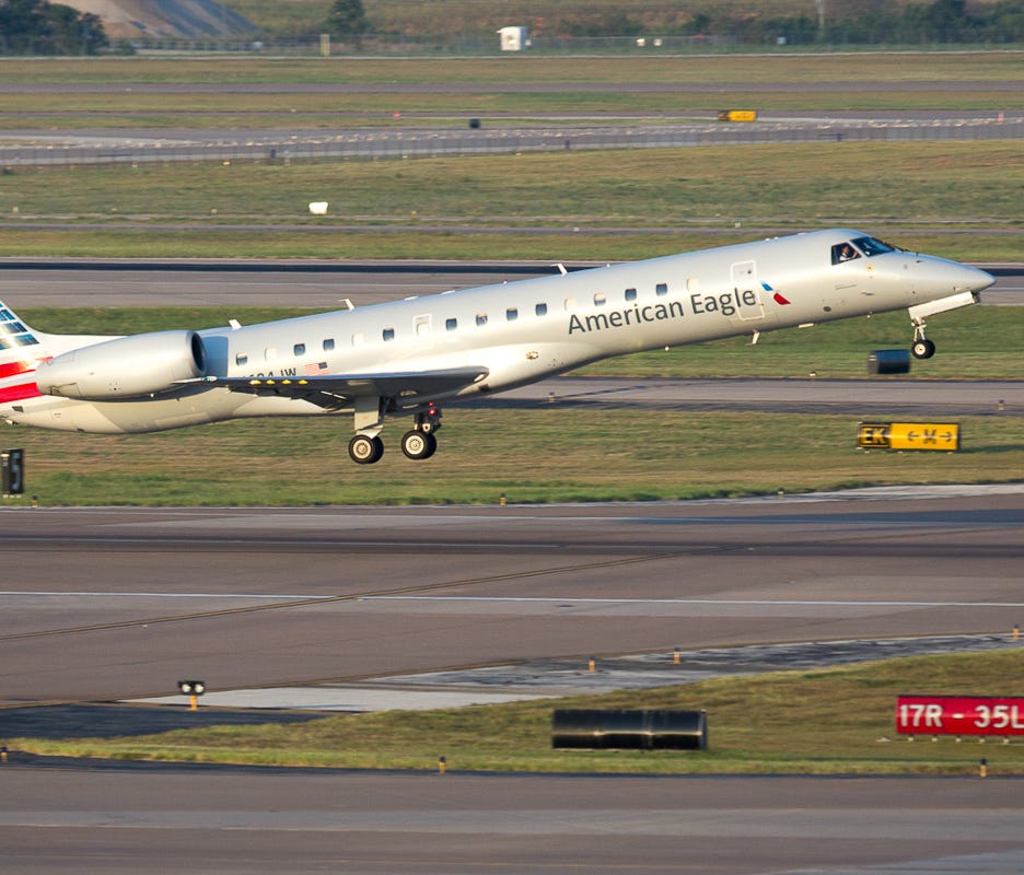 An American Eagle Embraer ERJ-145 regional jet takes off from Dallas/Fort Worth International Airport on Aug. 5, 2015.