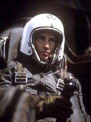 Sam Shepard as Chuck Yeager, seated in cockpit.