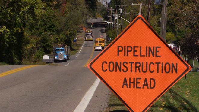 Signs are seen along Broadway in Verplanck in October 2015, warning motorists of pipeline construction as part of Spectra Energy's Algonquin natural gas pipeline expansion.