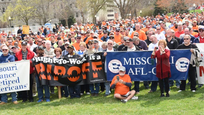 Hundreds of union members from across Missouri converged on the Capitol lawn in Jefferson City, Mo., Wednesday, March 30, 2016, to fight a bill to require public employees to give annual written consent before union dues could be withheld from their paychecks.