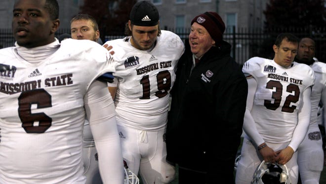 Missouri State head coach Terry Allen talks with players after the Bears loss to North Dakota State on Nov. 15, 2014.