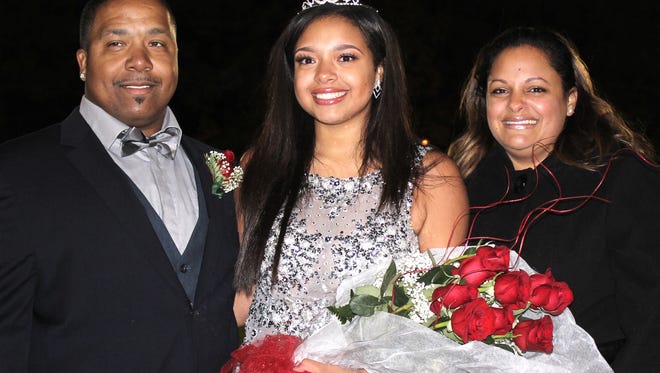 Destini Clark, Delsea Regional High School's Homecoming Queen, is pictured with her parents, Walter Clark and Cheryl Waters.