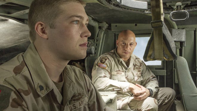Vin Diesel and Joe Alwyn in "Billy Lynn's Long Halftime Walk." The movie is playing at Frank Theatres Queensgate Stadium 13 and R/C Hanover Movies.