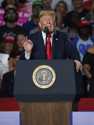 President Donald Trump speaks during a rally at Olentangy Orange High School in Lewis Center on Saturday.