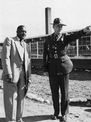 Principal C.U. James in 1954 hosts a State Highway