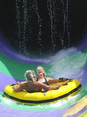 Ms Cheap laughs with excitement as she comes out of the latest addition at Nashville Shores, “The Big Kahuna.” Jennifer Clemens makes the most of her Nashville Shores season pass.