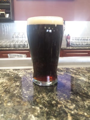 Carson's Brewery recently released a Black IPA called The Darkness. It lives up to its name.