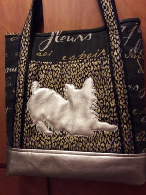 This handmade tote bag will be raffled off April 30. Ticket sales benefit rescue dogs in the care of Salem Dogs.