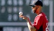 David Price balances a ball on his fingers during batting
